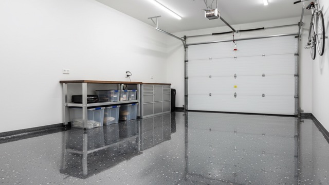 Garage with glossy reflective metallic-grey epoxy floor